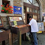 Tourists visiting bookshop in the village Redu, Ardennes, Belgium
